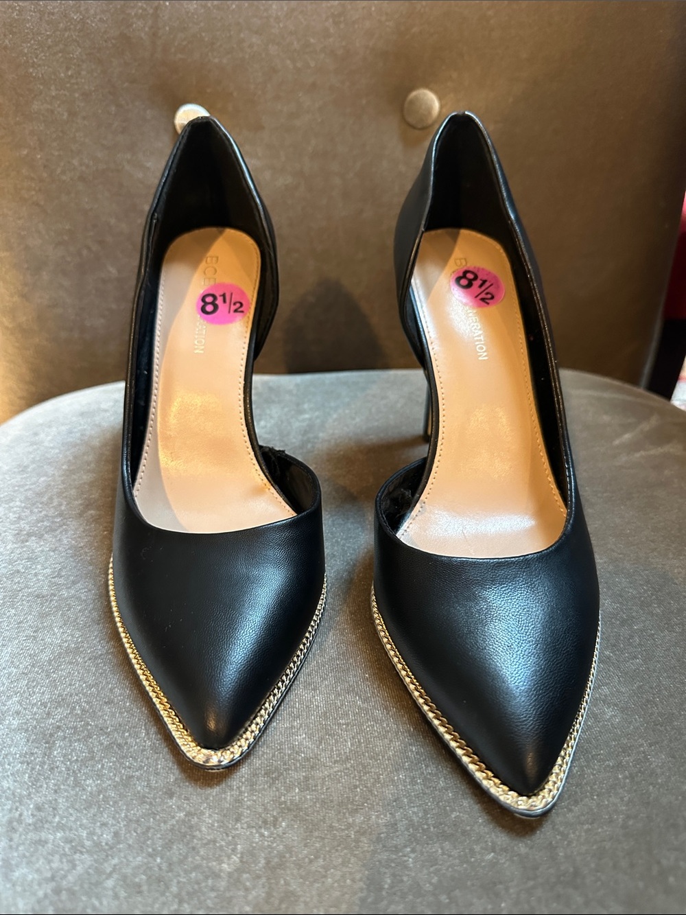 BCBGeneration Black Pointed Toe Heels with Gold Chain Trim